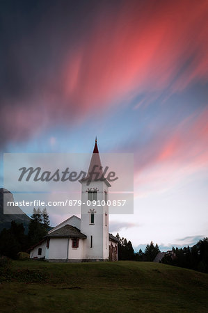 Pink clouds at sunset on Chiesa Bianca, Maloja, Bregaglia Valley, Canton of Graubünden, Engadin, Switzerland