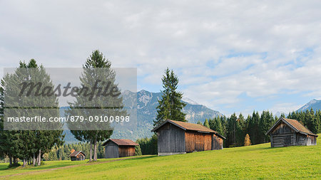Barns along the road to Garmisch Europe, Germany, Bavaria, Krun, Teensee
