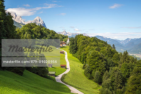 Wamberg village with Mount Zugspitze and Waxenstein on the background, Garmisch Partenkirchen, Bayern, Germany.