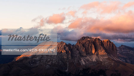 Aerial view of Sassolungo and Sassopiatto mountain range at sunset, Dolomites, South Tyrol, Italy, Europe