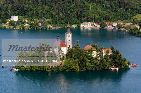 A view from above of Lake Bled and the Assumption of Mary Pilgrimage Church, Slovenia, Europe