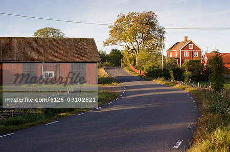 Houses along rural road in Krokshult, Sweden