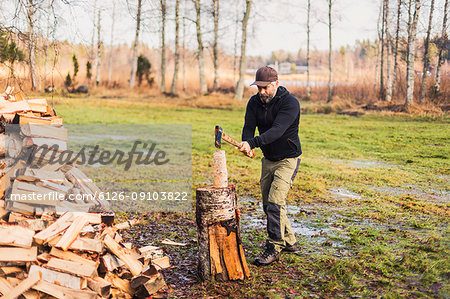 A man splitting fire wood