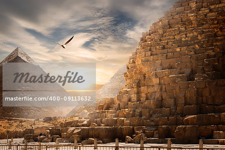 Egyptian pyramids in sand desert and clear sky