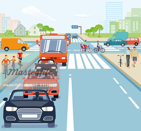 Road junction with cyclists and cars