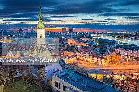 Cityscape image of Bratislava, capital city of Slovakia during dramatic spring sunrise.