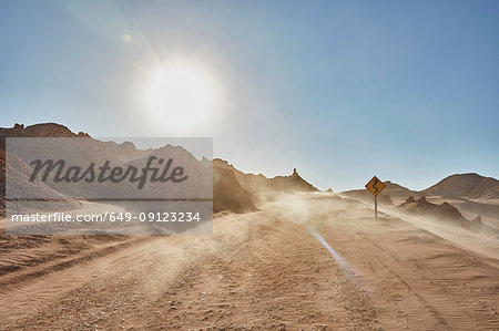 Dusty desert dirt track, San Pedro de Atacama, Chile Dusty desert dirt track, San Pedro de Atacama, Chile