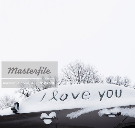 I love you written in snow on car windows