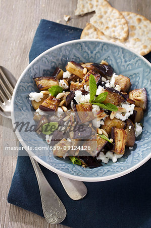 Aubergine and feta cheese salad with pine nuts