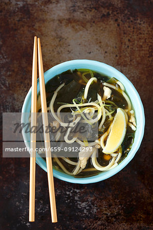 Asian-style chicken broth with wakame and lemon Asian-style chicken broth with wakame and lemon