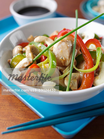 A bowl of chinese chicken A bowl of chinese chicken