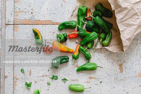 Fresh pimiento peppers in a paper bag (top view)