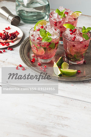 Pomegranate margarita with lime and mint