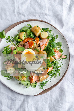 Potato and herb salad with honey roasted salmon and soft boiled egg