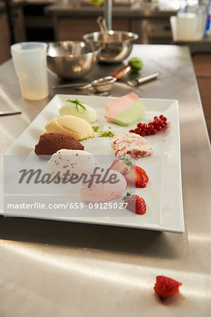 Various mousse samples and fresh berries