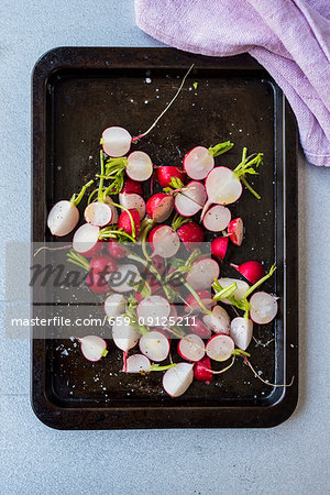 Radishes on a baking tray