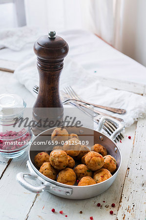 Fish bites with pink pepper