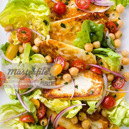 Pan fried Halloumi cheese with cherry tomatoes, chickpea and lettuce