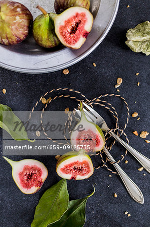 An arrangement of figs including halved figs