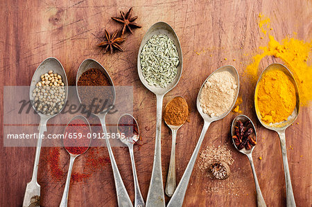 Assorted spices on vintage spoons Assorted spices on vintage spoons