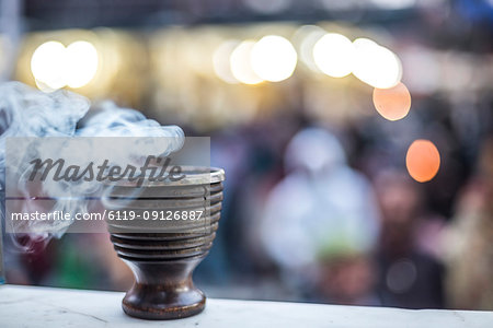 Incense burning at a Hindu temple in New Delhi, India, Asia