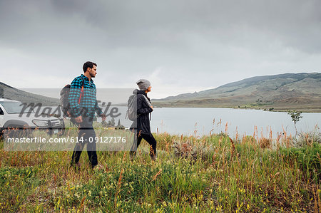 Couple walking beside Dillon Reservoir, Silverthorne, Colorado, USA