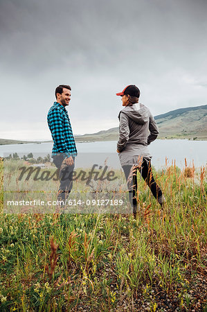 Couple standing beside Dillon Reservoir, Silverthorne, Colorado, USA