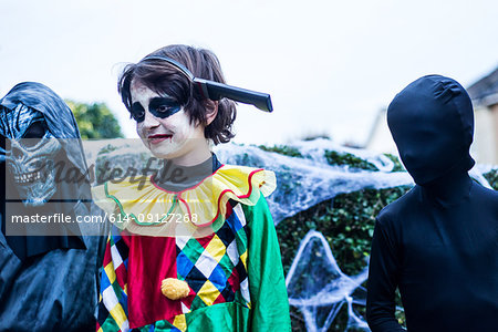 Young boys dressed in halloween costume, outdoors