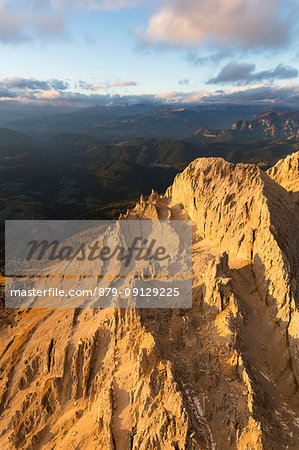 Aerial view of the rocky peaks of Latemar massif at sunset, Dolomites, South Tyrol, Italy Aerial view of the rocky peaks of Latemar massif at sunset, Dolomites, South Tyrol, Italy