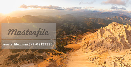 Panoramic aerial view of Latemar massif and Obereggen at sunset, Dolomites, South Tyrol, Italy