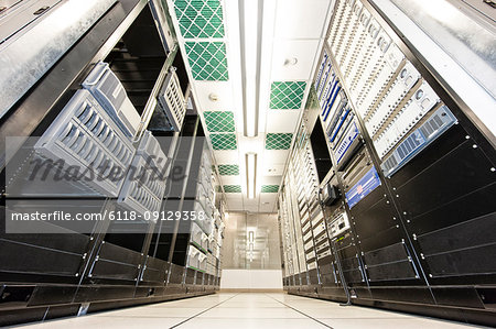 Storage racks aligned in a computer server room.