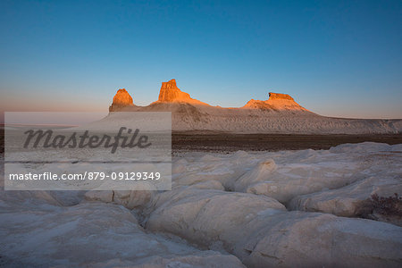 Rock formations at sunrise at Boszhira at Caspian Depression desert, Aktau, Mangystau region, Kazakhstan