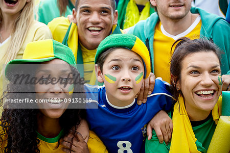 Brazilian football fans watching football match