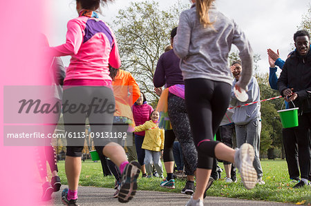 Marathon runners running in park