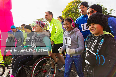 Enthusiastic crowd ready at charity race starting line