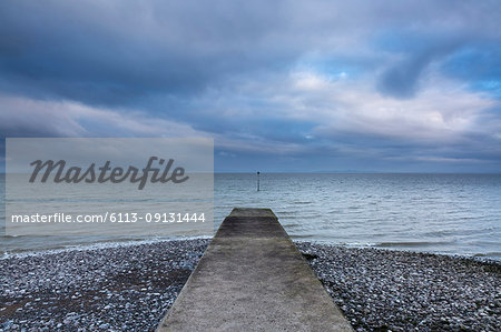 Jetty with stormy ocean view, Silloth, Cumbria, UK