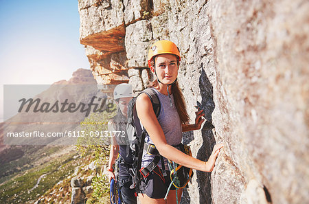 Portrait confident female rock climber