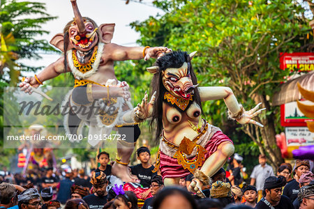 Procession of Ogoh-ogoh statues in the Ngrupuk Parade on the eve of Nyepi Day in Ubud in Gianyar, Bali, Indonesia