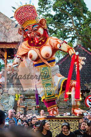 Procession with an Ogoh-ogoh statue in the Ngrupuk Parade on the eve of Nyepi Day in Ubud in Gianyar, Bali, Indonesia