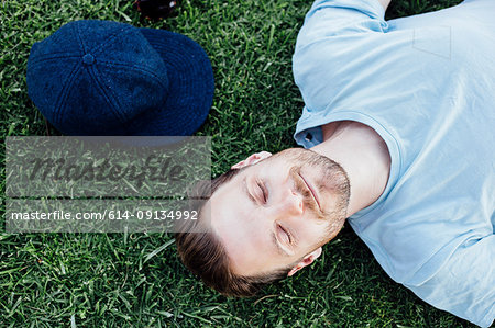 Man sleeping on grass