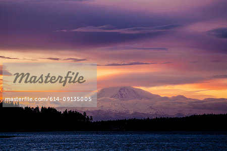 Snow covered mountain at sunset, Bainbridge, Washington, United States