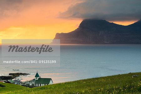 Church on the ocean shore towards Kalsoy Island, Gjogv, Eysturoy Island, Faroe Islands, Denmark, Europe