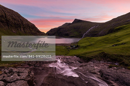 Sunset on lagoon surrounded by mountains, Saksun, Streymoy Island, Faroe Islands, Denmark, Europe