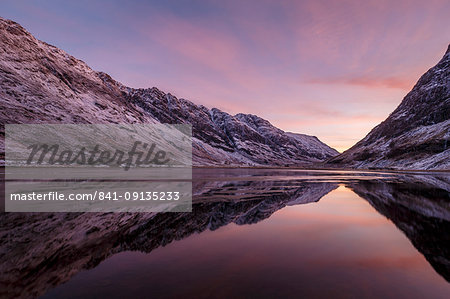 Loch Achtriochtan in winter with snow-capped mountains and reflections, Glencoe, Highlands, Scotland, United Kingdom, Europe