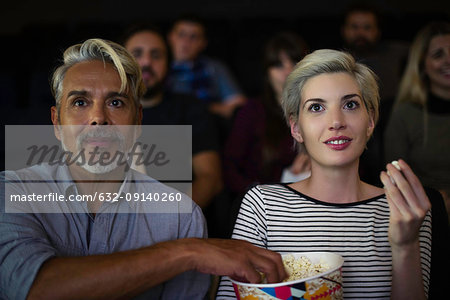 Couple watching movie together