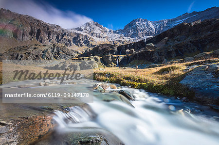 Flowing water of alpine creek, Alpe Fora, Malenco Valley, province of Sondrio, Valtellina, Lombardy, Italy, Europe