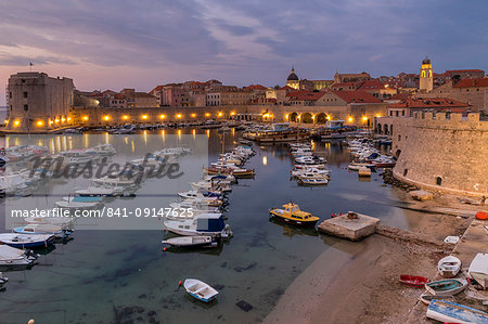 Elevated view over the port and the old town at dawn, UNESCO World Heritage Site, Dubrovnik, Croatia, Europe