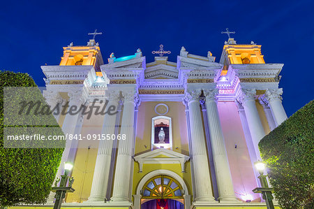 The illuminated Cathedral of Huehuetenango at dusk, Huehuetenango, Guatemala, Central America