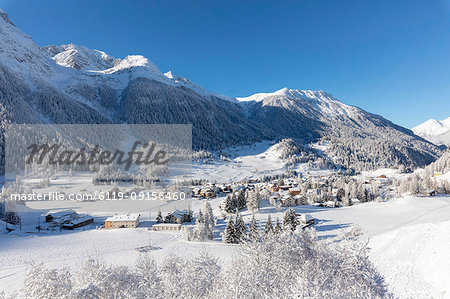 Alpine village of Bergun covered with snow, Albula Valley, Canton of Graubunden, Switzerland, Europe Alpine village of Bergun covered with snow, Albula Valley, Canton of Graubunden, Switzerland, Europe