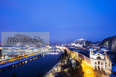 View over the old town, UNESCO World Heritage Site, Markus church and Hohensalzburg Castle at dusk, Salzburg, Austria, Europe